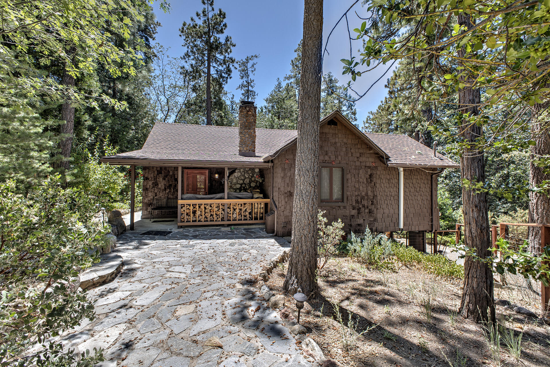 25395 Lodge Road Idyllwild, CA 92549 - Photo 3 of 53 a front view of a house with garden