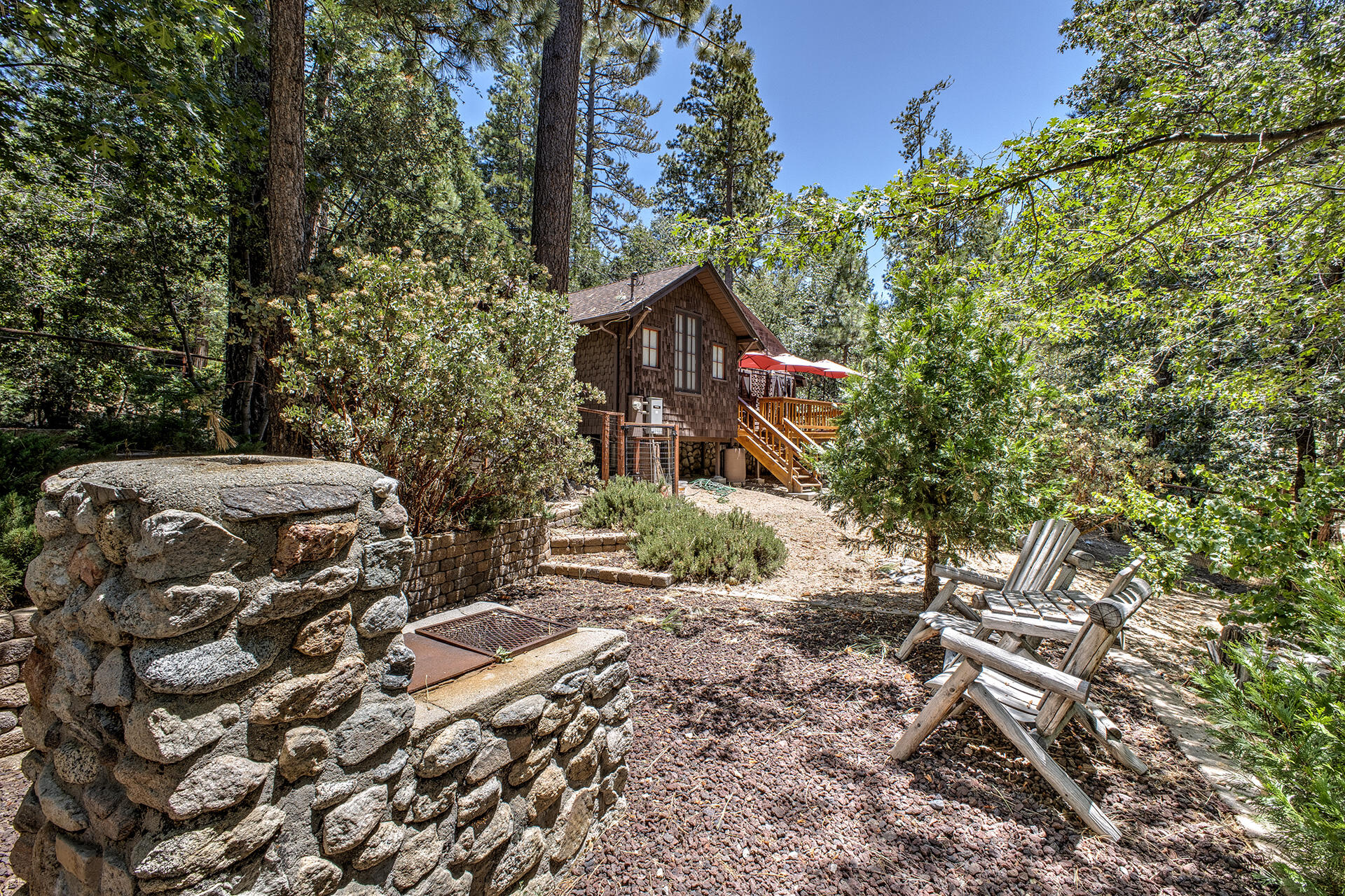 25395 Lodge Road Idyllwild, CA 92549 - Photo 39 of 53 a backyard of a house with lots of green space