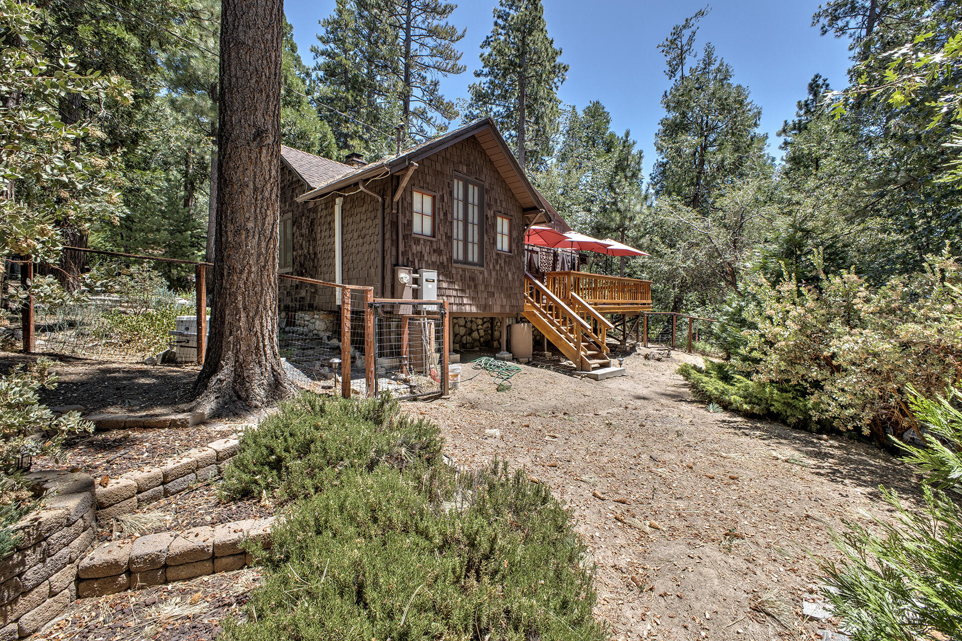 25395 Lodge Road Idyllwild, CA 92549 - Photo 40 of 53 a view of a house with a yard