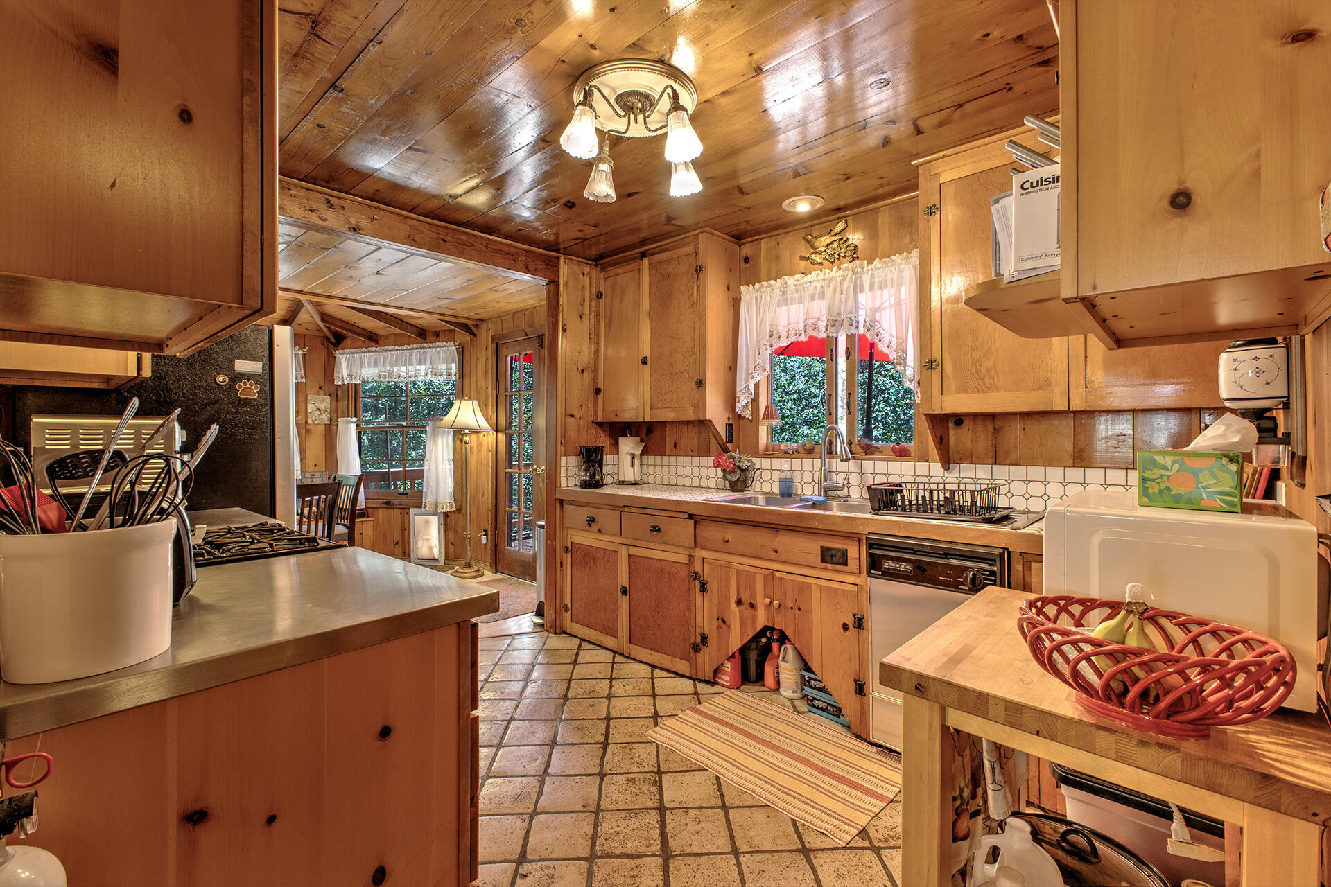 25395 Lodge Road Idyllwild, CA 92549 - Photo 8 of 53 a kitchen with stainless steel appliances granite countertop a sink and cabinets