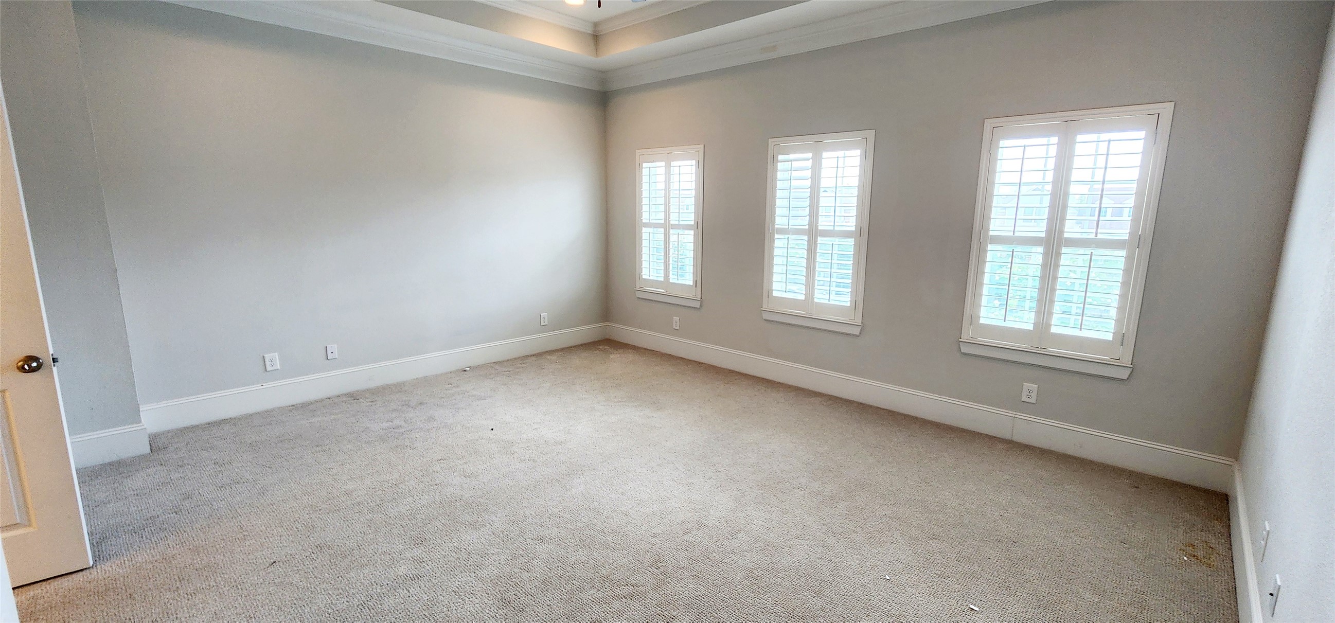 11 West Rafters Row The Woodlands, TX 77380 - Photo 25 of 31 an empty room with windows