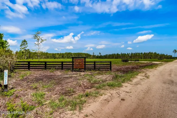 a view of a lake with a big yard