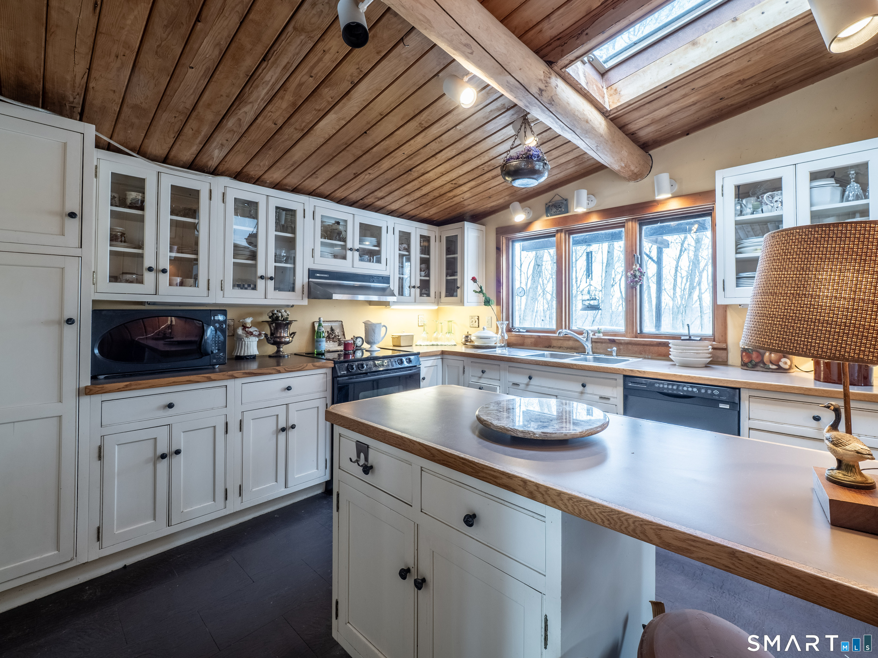 424 Old Sib Road Ridgefield, CT 06877 - Photo 14 of 27 a kitchen with stainless steel appliances granite countertop a sink a stove and cabinets