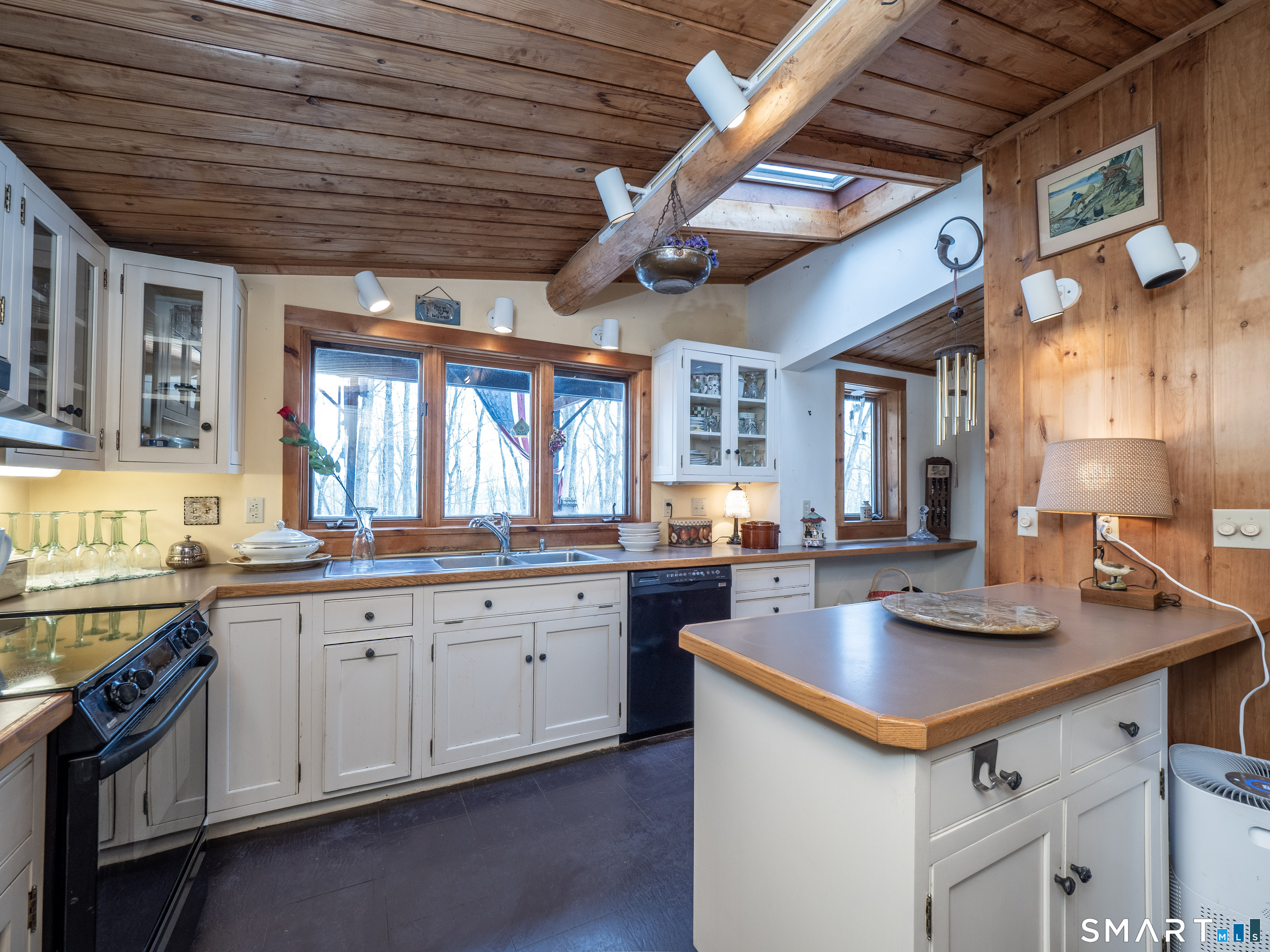 424 Old Sib Road Ridgefield, CT 06877 - Photo 15 of 27 a kitchen with stainless steel appliances granite countertop a sink a stove and cabinets