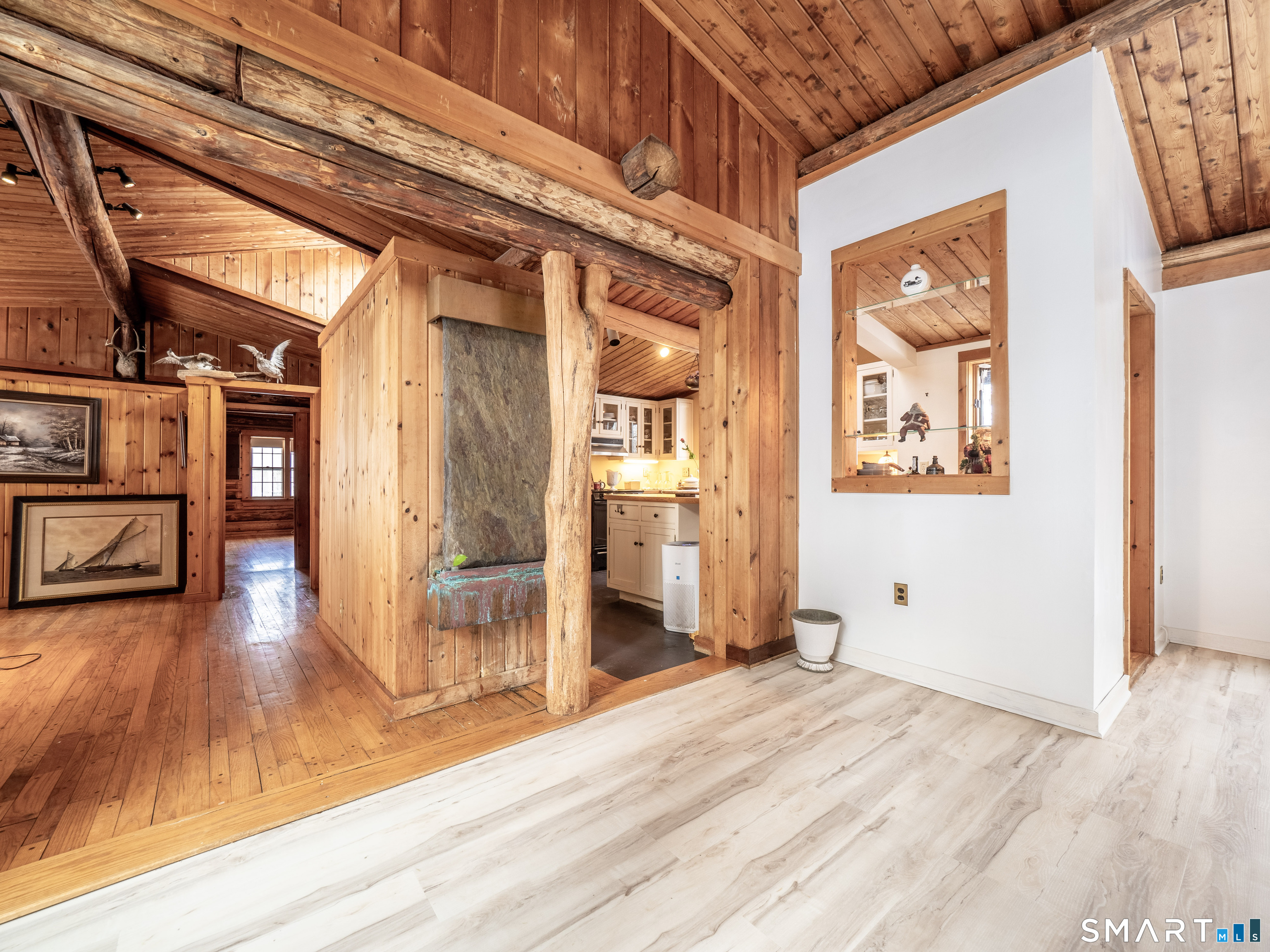 424 Old Sib Road Ridgefield, CT 06877 - Photo 2 of 27 an empty room with wooden floor and windows