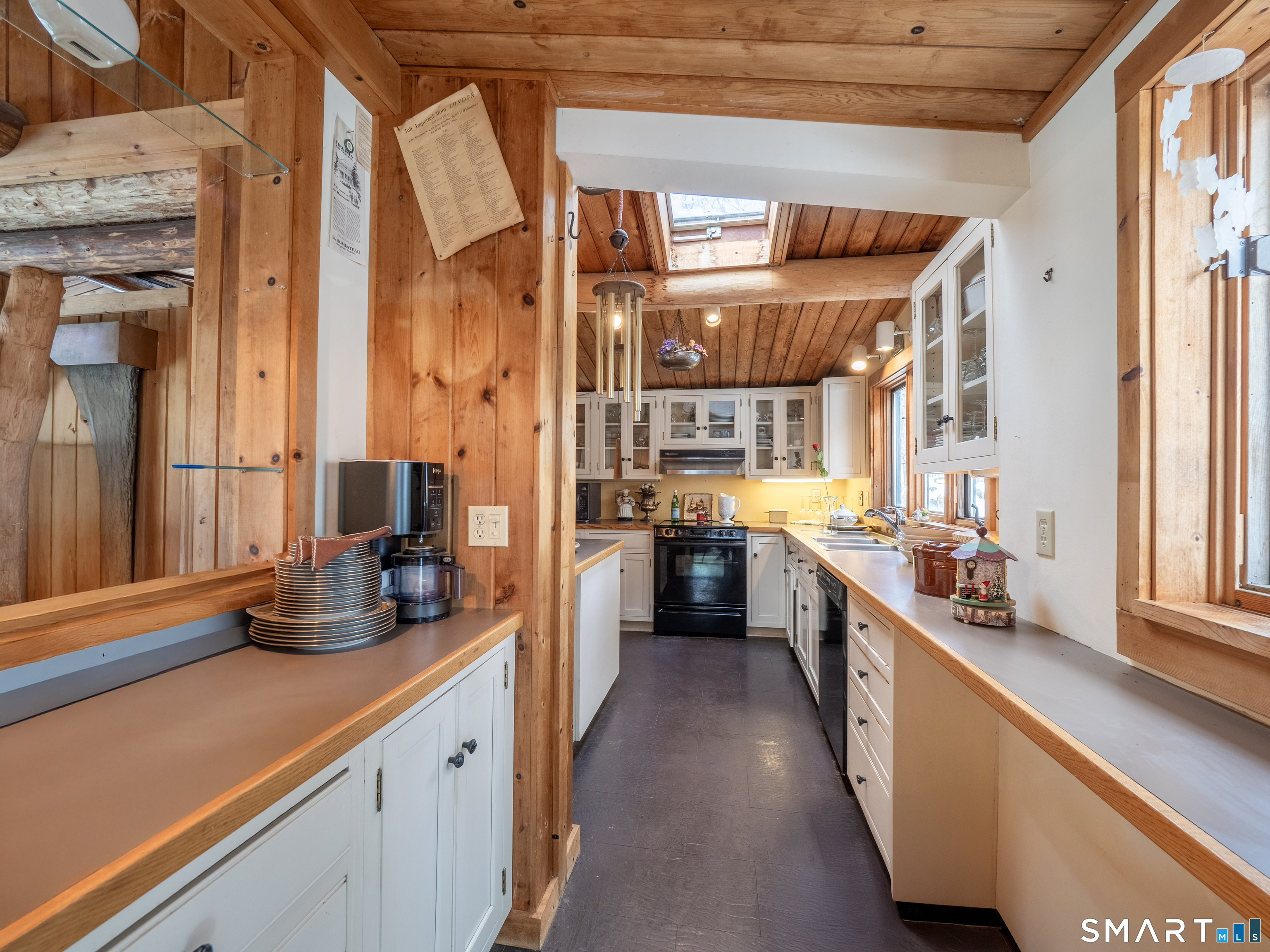 424 Old Sib Road Ridgefield, CT 06877 - Photo 4 of 27 a kitchen with counter top space and wooden floor