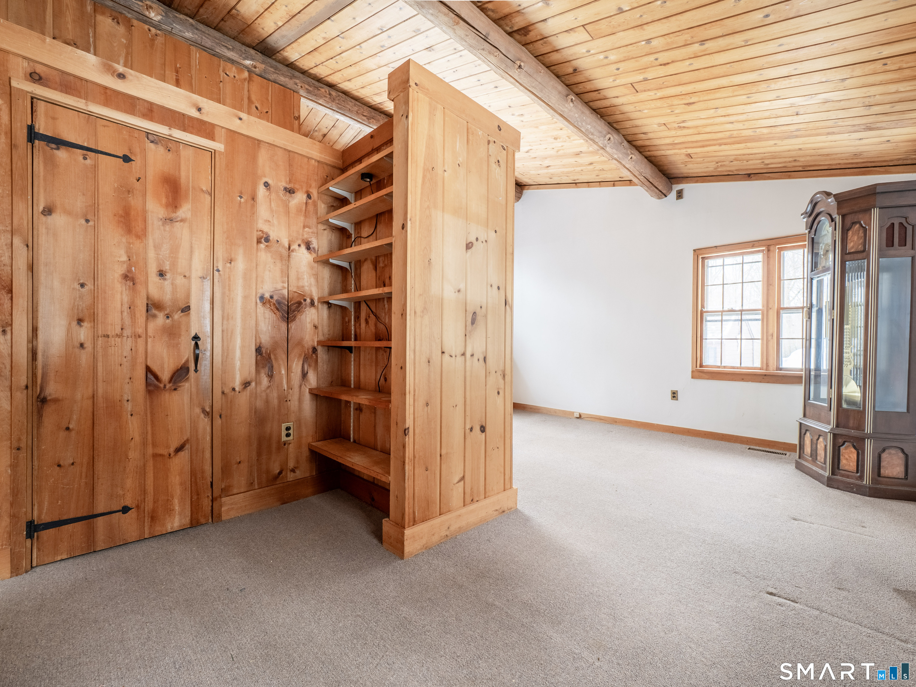424 Old Sib Road Ridgefield, CT 06877 - Photo 9 of 27 a view of an empty room with a window