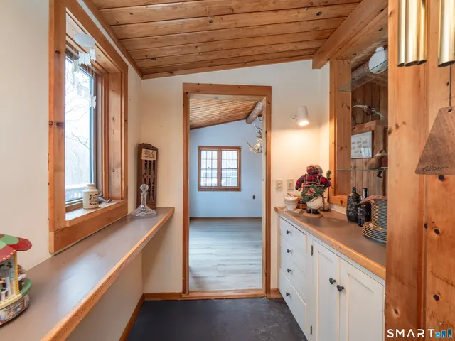 a kitchen with sink and cabinets