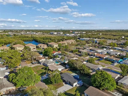 an aerial view of residential building with outdoor space