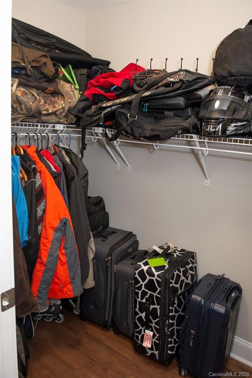 8585 Castor Road Salisbury, NC 28146 - Photo 20 of 39 a view of walk in closet with clothes