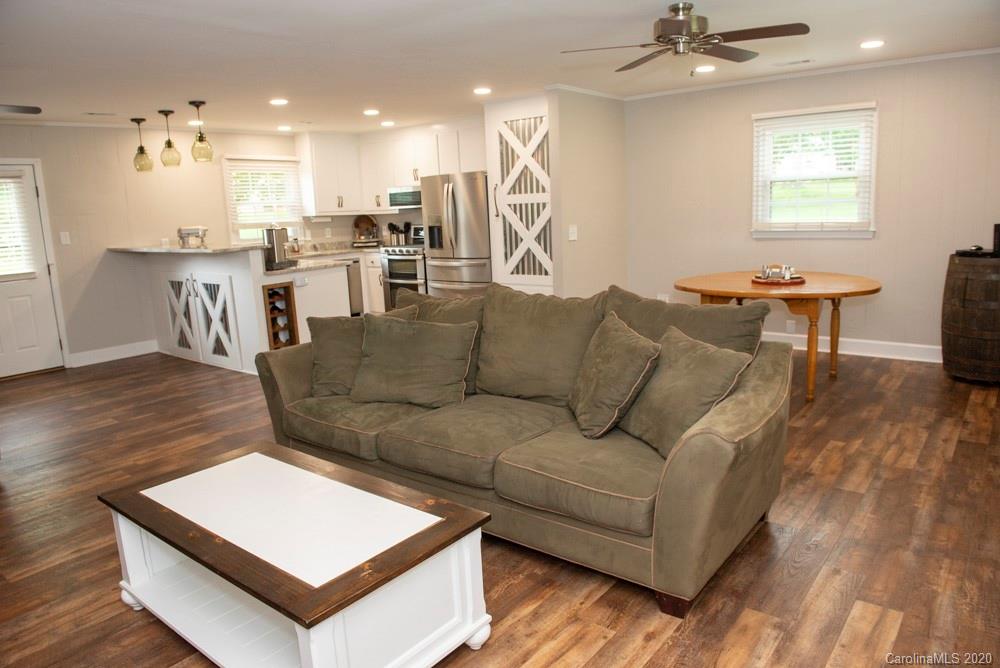 8585 Castor Road Salisbury, NC 28146 - Photo 23 of 39 a living room with furniture and kitchen view