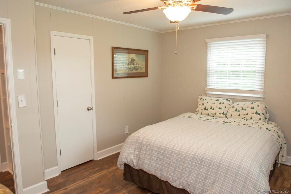 8585 Castor Road Salisbury, NC 28146 - Photo 35 of 39 a bedroom with a bed and a window