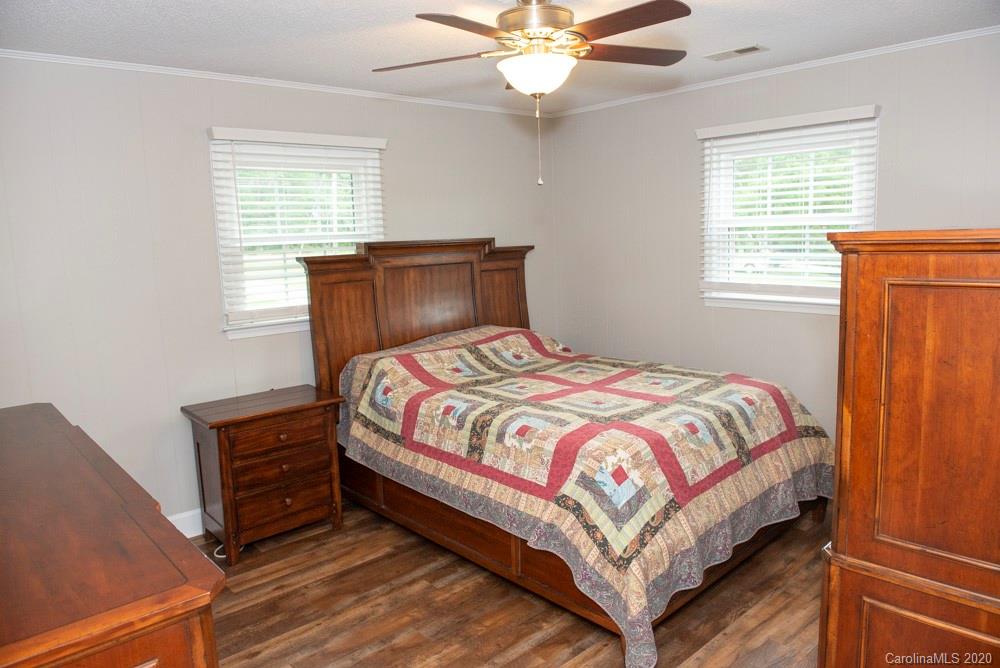 8585 Castor Road Salisbury, NC 28146 - Photo 36 of 39 a bedroom with a bed and window