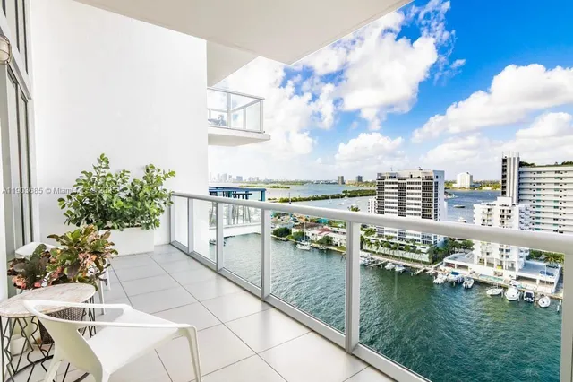 a view of swimming pool from a balcony