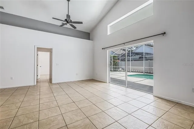 a view of an empty room and window