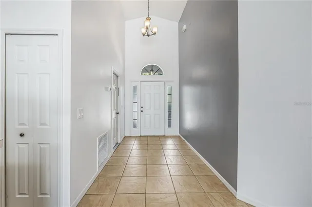 a view of a hallway with entryway