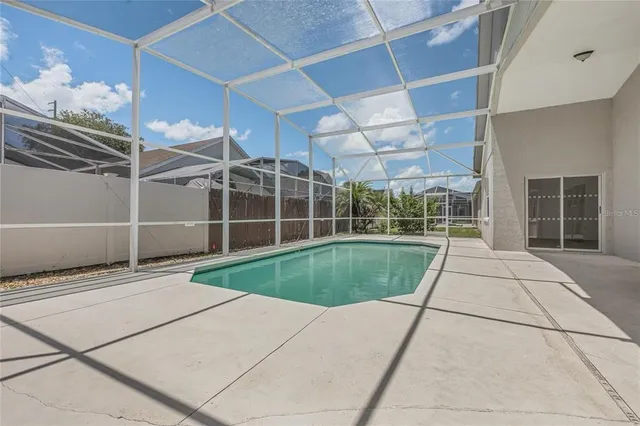 a view of a backyard of a house