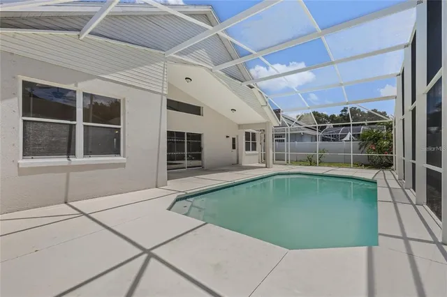 a view of a house with a swimming pool