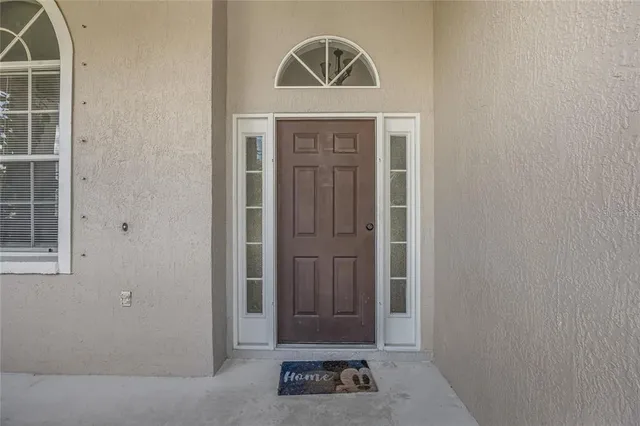 a view of front door with entryway