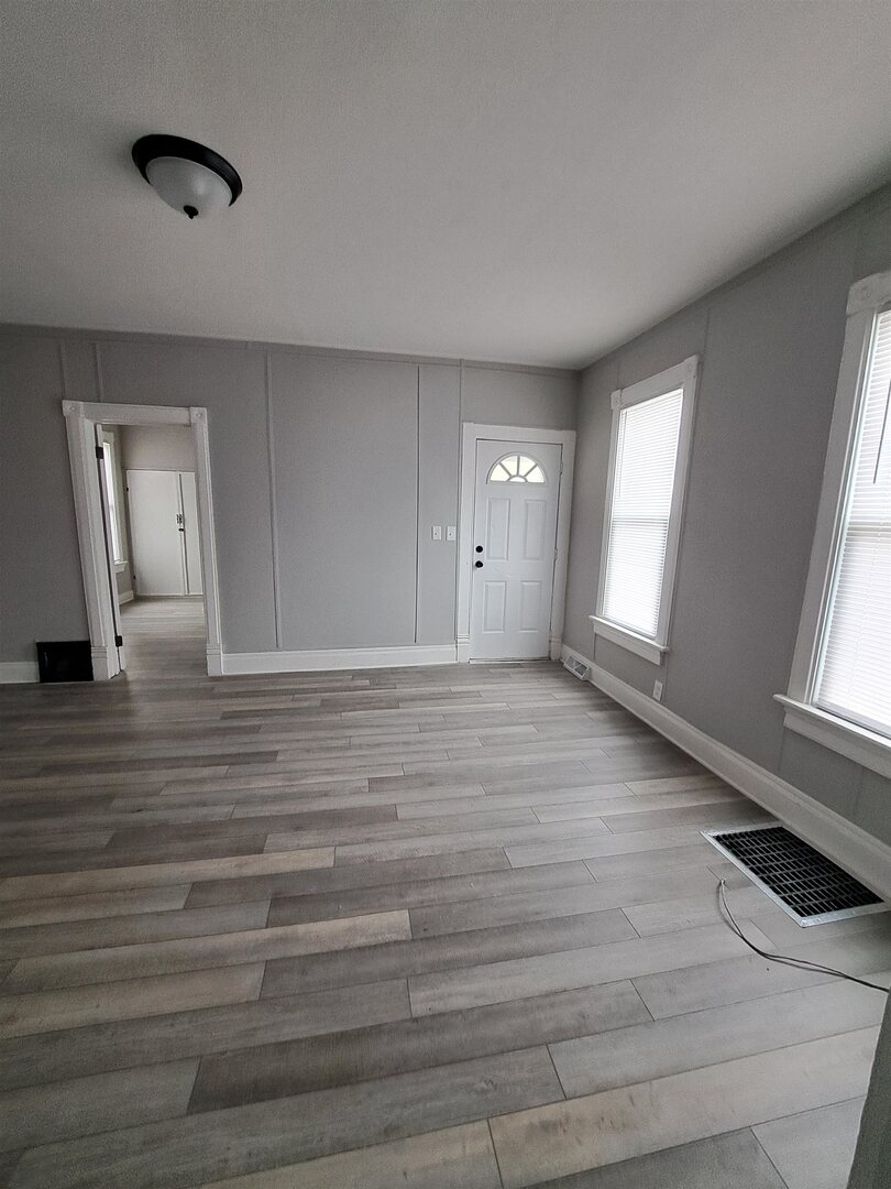 801 41st Street Rock Island, IL 61201 - Photo 5 of 8 a view of an empty room and window