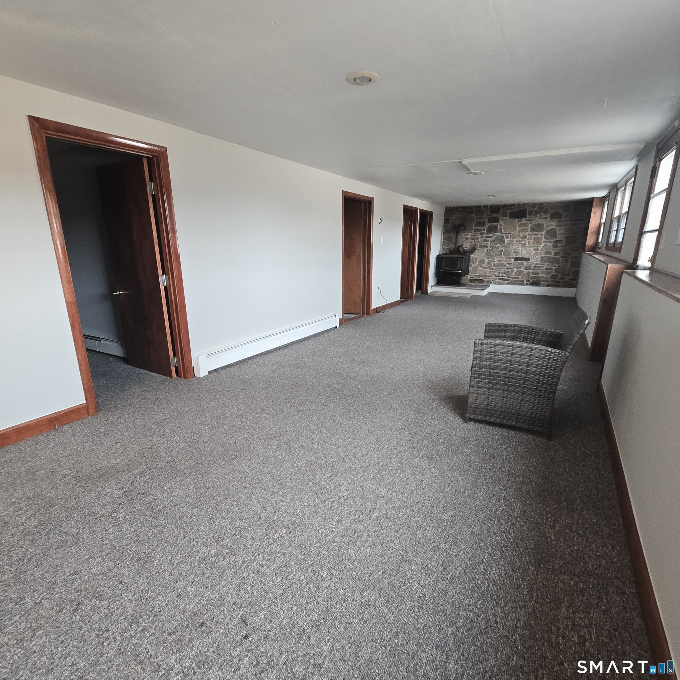26 Tifton Road Wethersfield, CT 06109 - Photo 16 of 26 a view of hallway with couch and stairs