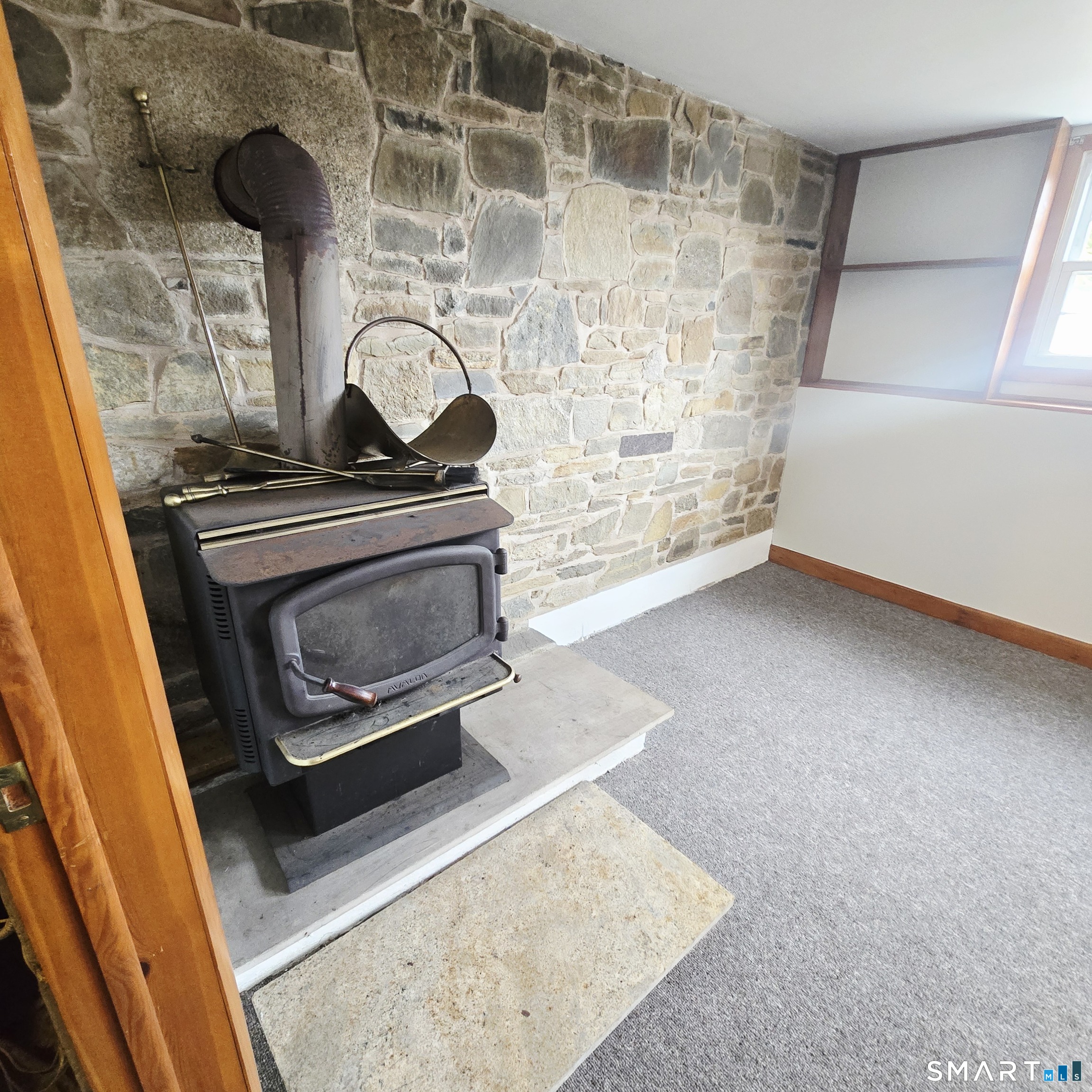 26 Tifton Road Wethersfield, CT 06109 - Photo 23 of 26 a stove top oven sitting inside of a kitchen