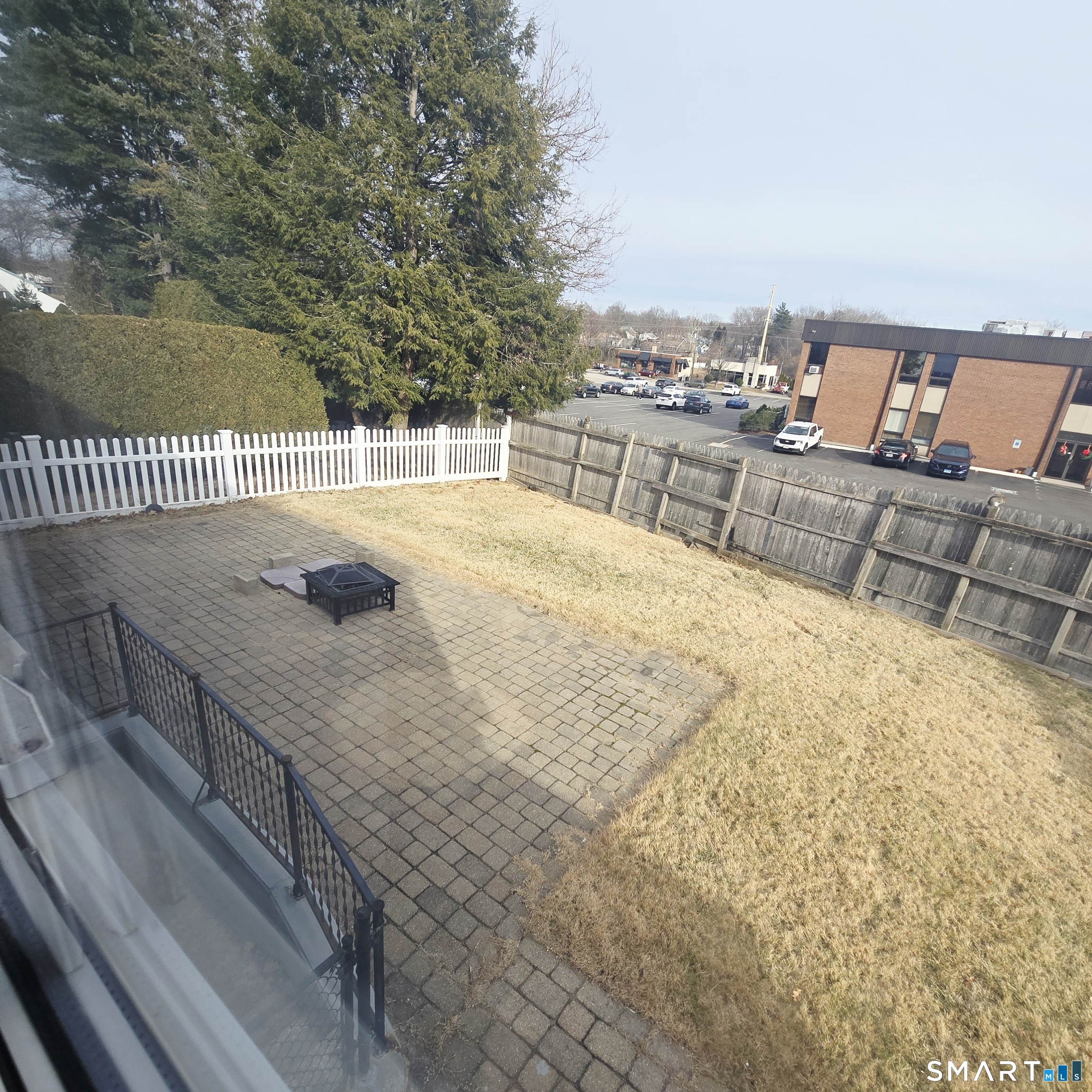 26 Tifton Road Wethersfield, CT 06109 - Photo 25 of 26 a view of a swimming pool with an outdoor seating
