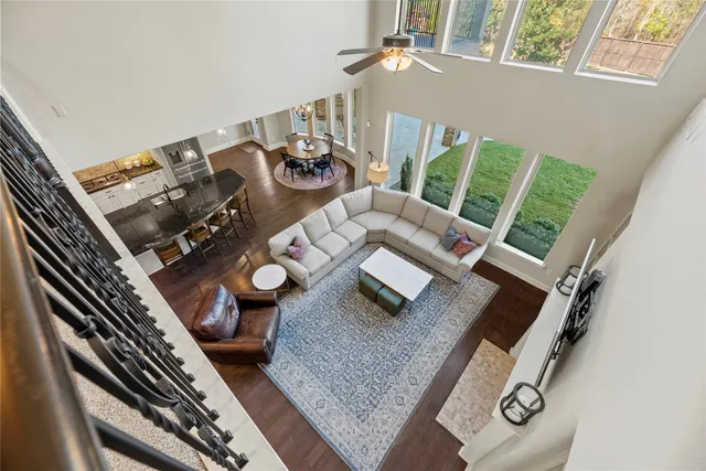 a living room with furniture and next to a window