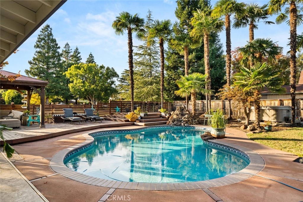 108 Estates Drive Chico, CA 95928 - Photo 31 of 45 a view of a swimming pool with outdoor seating