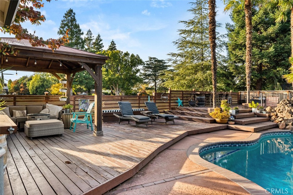 108 Estates Drive Chico, CA 95928 - Photo 36 of 45 a view of a patio with swimming pool