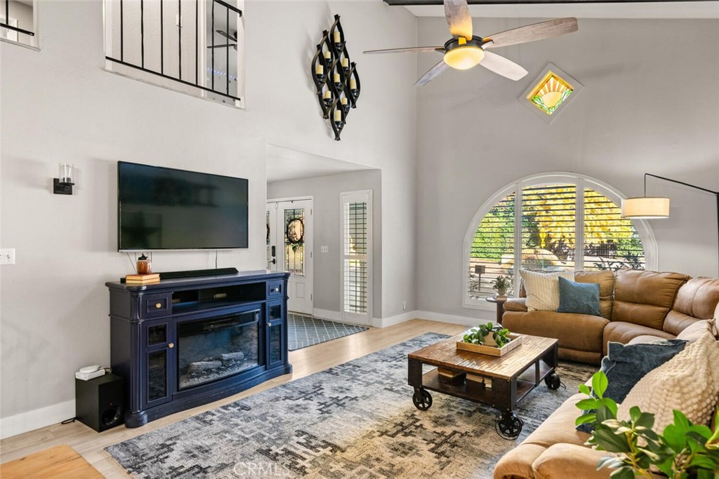 108 Estates Drive Chico, CA 95928 - Photo 6 of 45 a living room with furniture and a flat screen tv