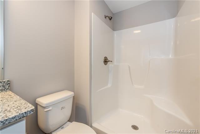 321 Salisbury Road Statesville, NC 28677 - Photo 11 of 13 a white toilet sitting next to a bath tub