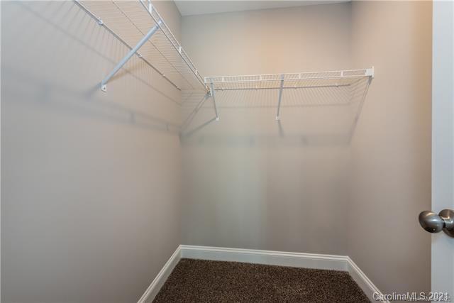 321 Salisbury Road Statesville, NC 28677 - Photo 8 of 13 a view of a room with racks on the wall