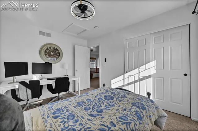 a view of storage and utility room with washer and dryer
