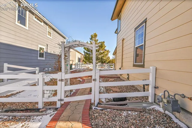 a view of a backyard with a patio