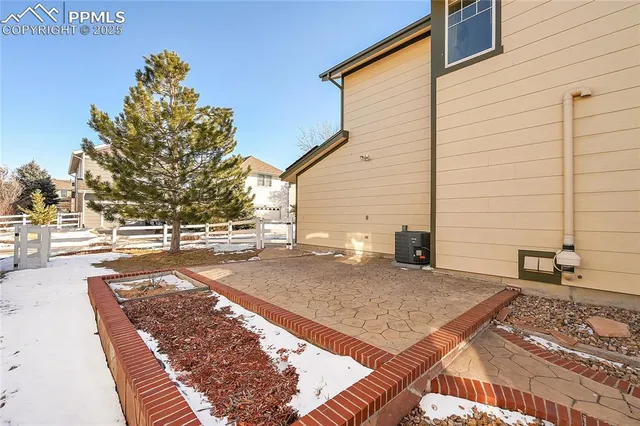 a front view of a building with parking