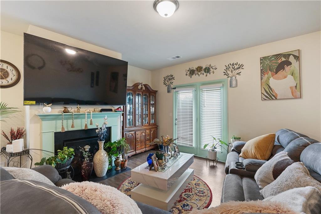 153 Centennial Ridge Drive Acworth, GA 30102 - Photo 14 of 38 a living room with furniture and a flat screen tv