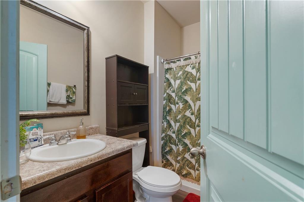 153 Centennial Ridge Drive Acworth, GA 30102 - Photo 16 of 38 a bathroom with a sink toilet and shower