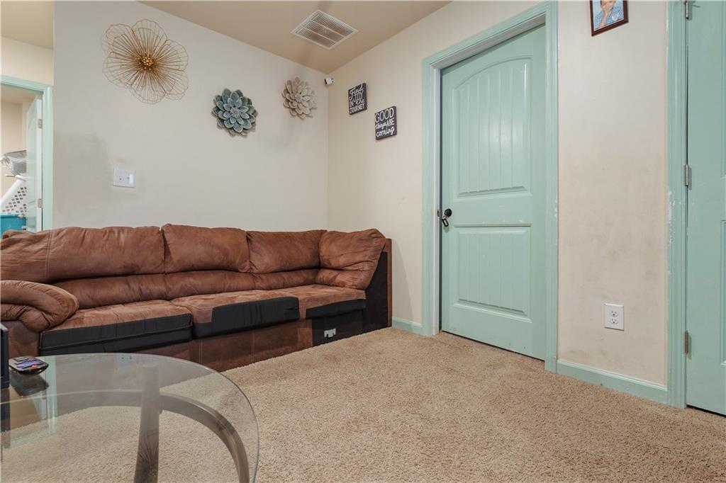 153 Centennial Ridge Drive Acworth, GA 30102 - Photo 21 of 38 a living room with furniture and a air conditioner vent