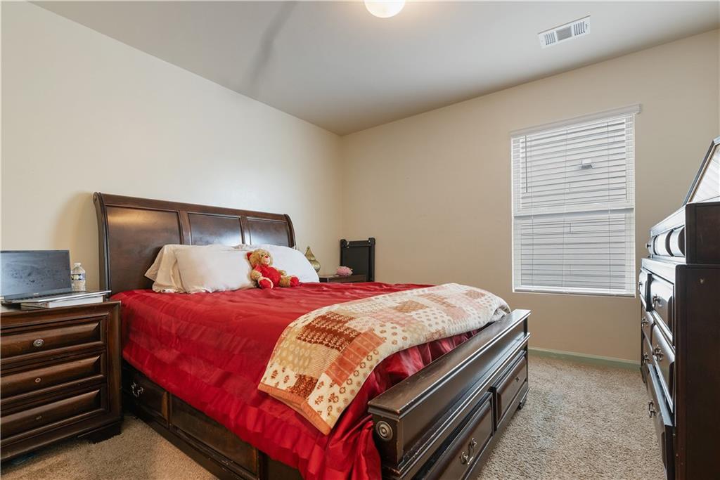 153 Centennial Ridge Drive Acworth, GA 30102 - Photo 29 of 38 a bedroom with a bed and a window