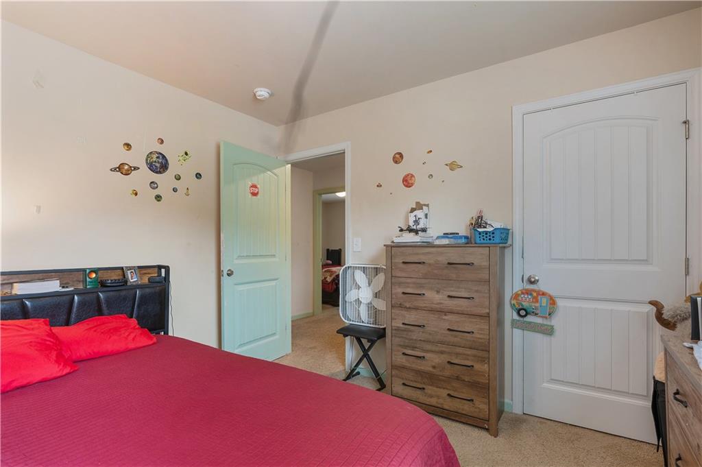153 Centennial Ridge Drive Acworth, GA 30102 - Photo 38 of 38 a bedroom with a bed and a closet