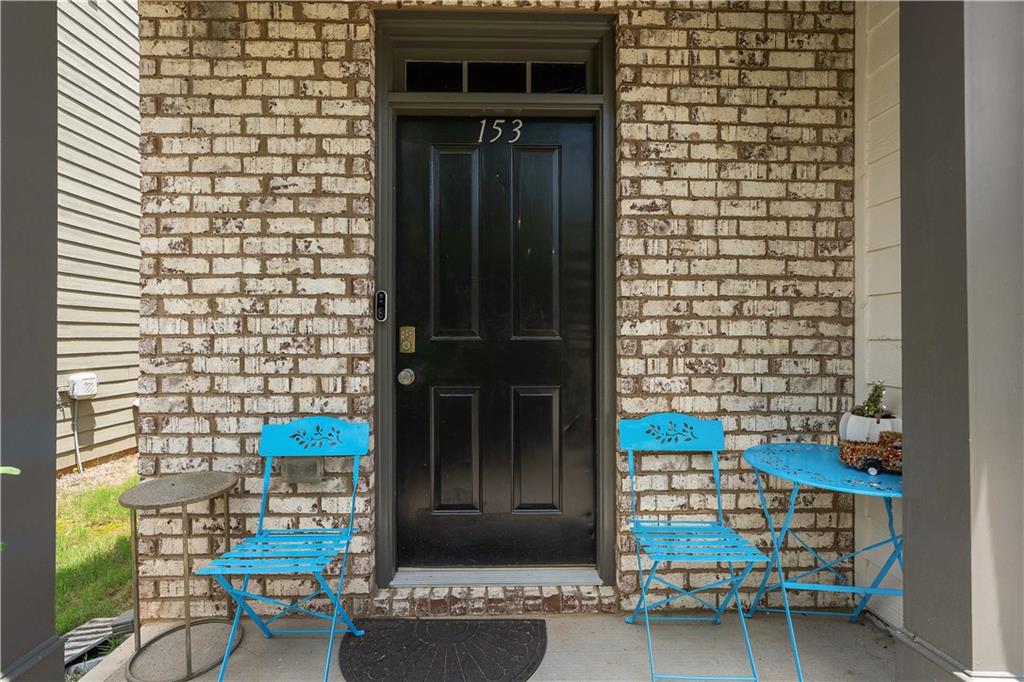153 Centennial Ridge Drive Acworth, GA 30102 - Photo 4 of 38 a view of a door of the house with outdoor seating