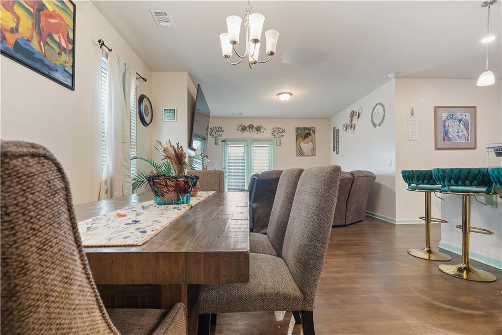 153 Centennial Ridge Drive Acworth, GA 30102 - Photo 6 of 38 a view of a dining room with furniture