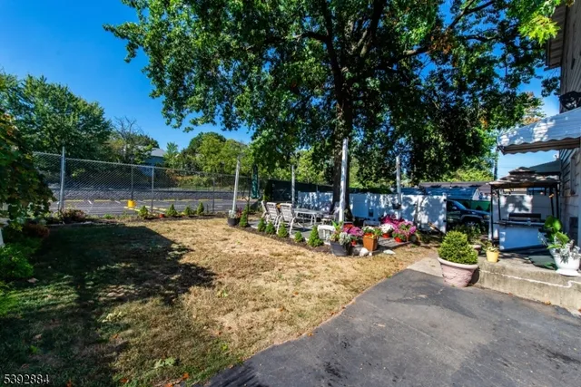 a view of a chairs and tables in the patio