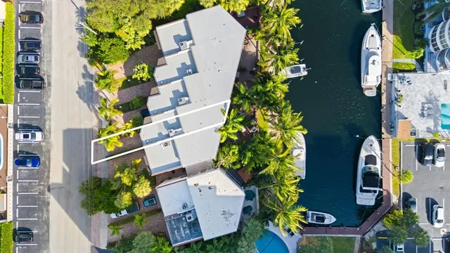 an aerial view of residential house with outdoor space and swimming pool