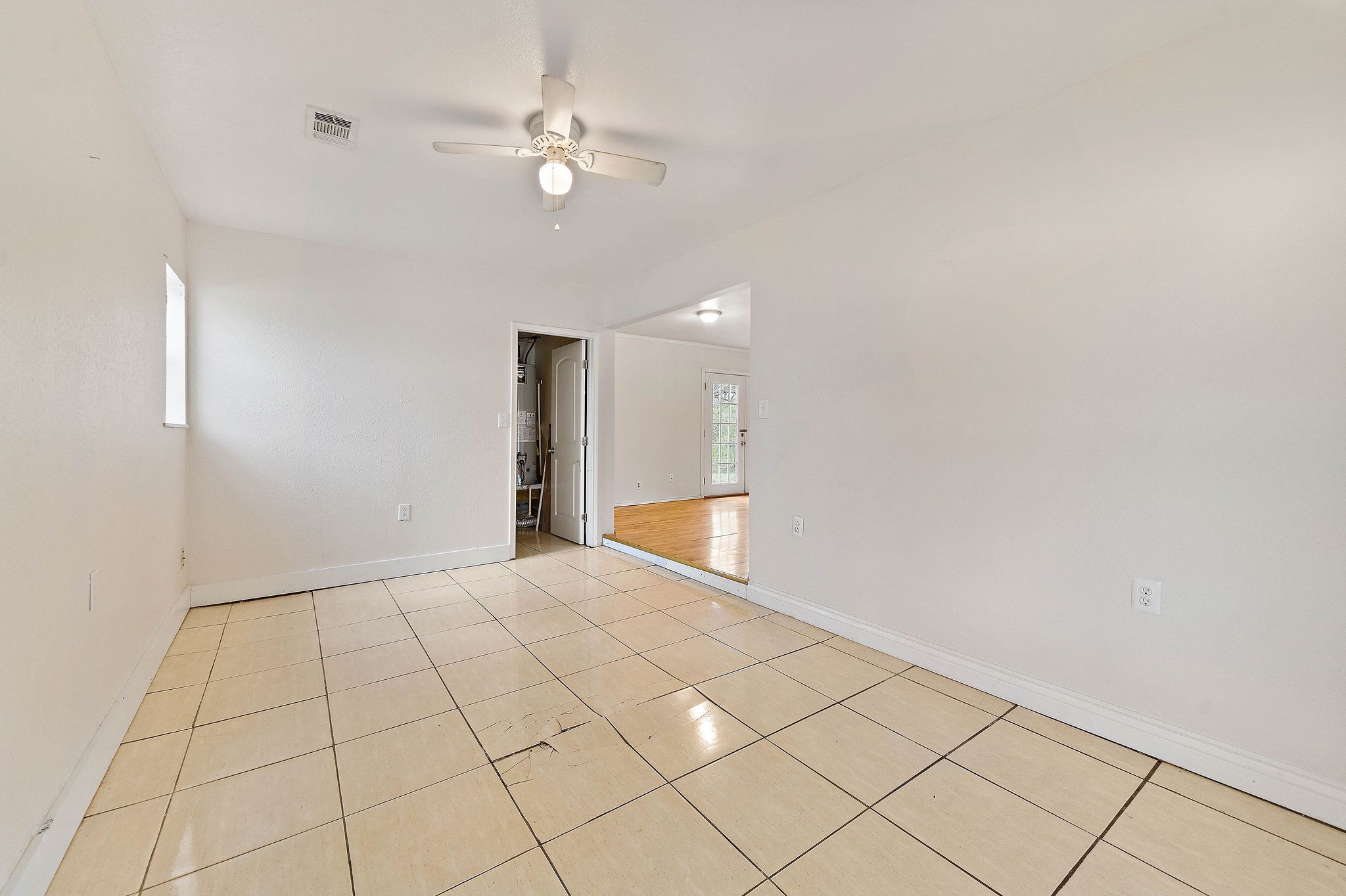 3230 Virginia Street La Marque, TX 77568 - Photo 11 of 18 a view of an empty room with a chandelier fan