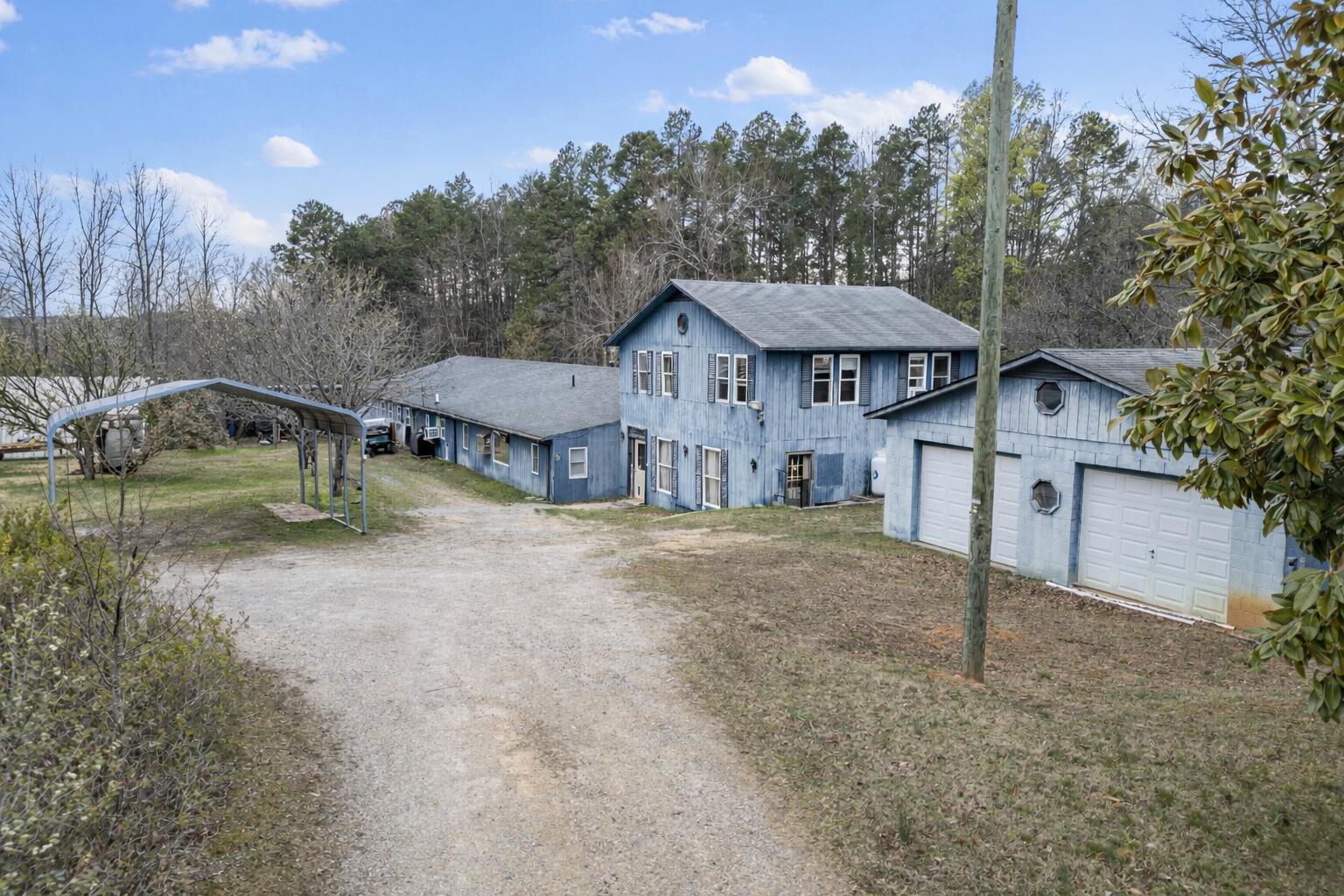 344 Slayton Road Sutherlin, VA 24594 - Photo 3 of 56 Rural blue house with workshop and carpo