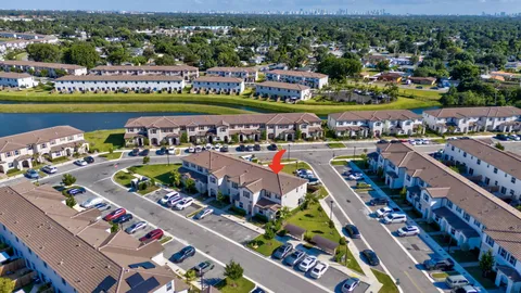an aerial view of lake and residential houses