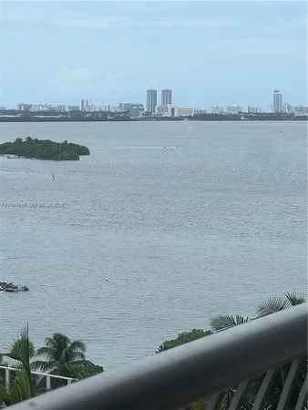 a view of a lake from a terrace