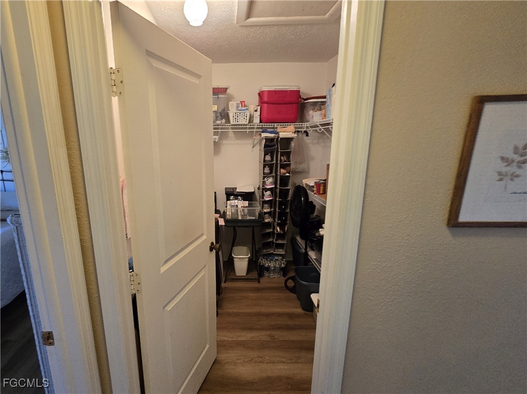 4631 Southeast 5th Avenue, Unit 207 Cape Coral, FL 33904 - Photo 11 of 19 a view of a hallway with seating area